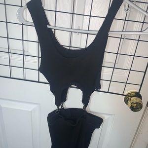 Linked dress/2 piece. Clasps hold top and bottom together.